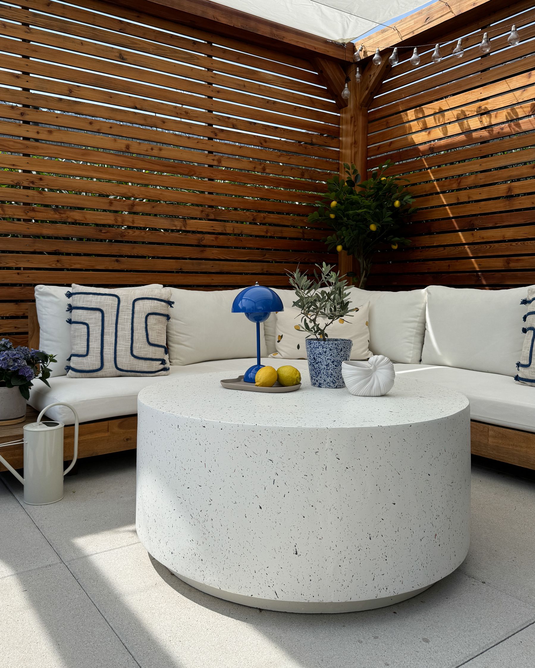 TREZZO ROUND COFFEE TABLE IN OFF - WHITE TERRAZZO EFFECT